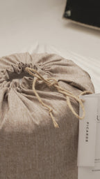 The set tied closed in its linen bag with the Picarde card tucked alongside