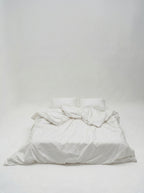 Picarde Form duvet cover set in white, 1000 thread count Egyptian cotton on a made bed